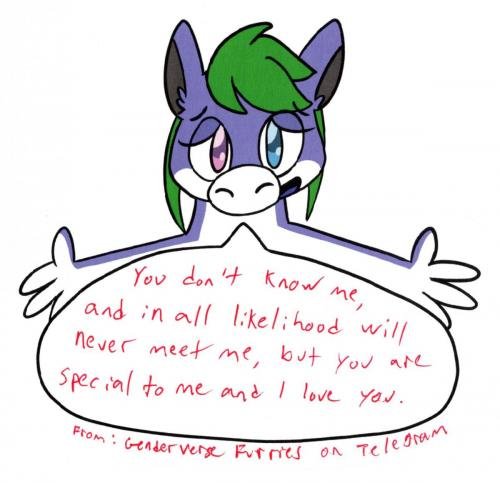 Tanby, the group mascot, a purple alien creature with green hair, offers a caring hug.