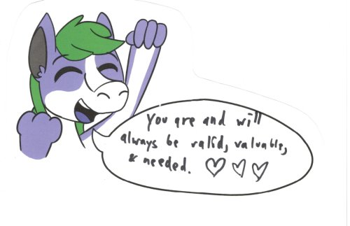 Tanby, the group mascot, a purple alien creature with green hair, pumps their fist in an excited cheer!