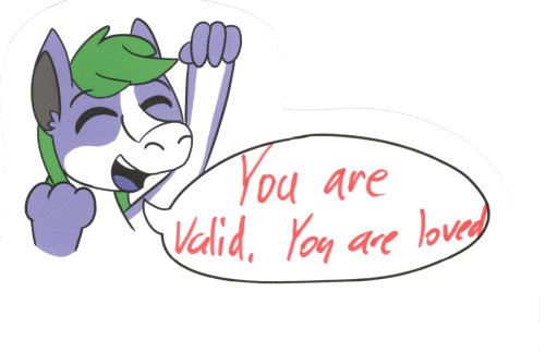 Tanby, the group mascot, a purple alien creature with green hair, pumps their fist in an excited cheer!